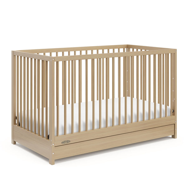 Graco Teddi 4-in-1 Convertible Crib with Drawer, Driftwood N9